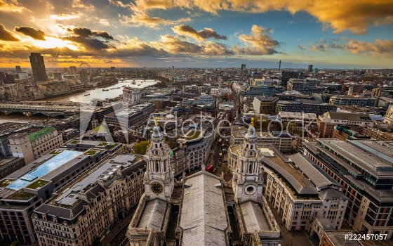 Bild på London England - Panoramic aerial skyline view of London taken from the top of StPauls Cathedral at sunset with dramatic clouds